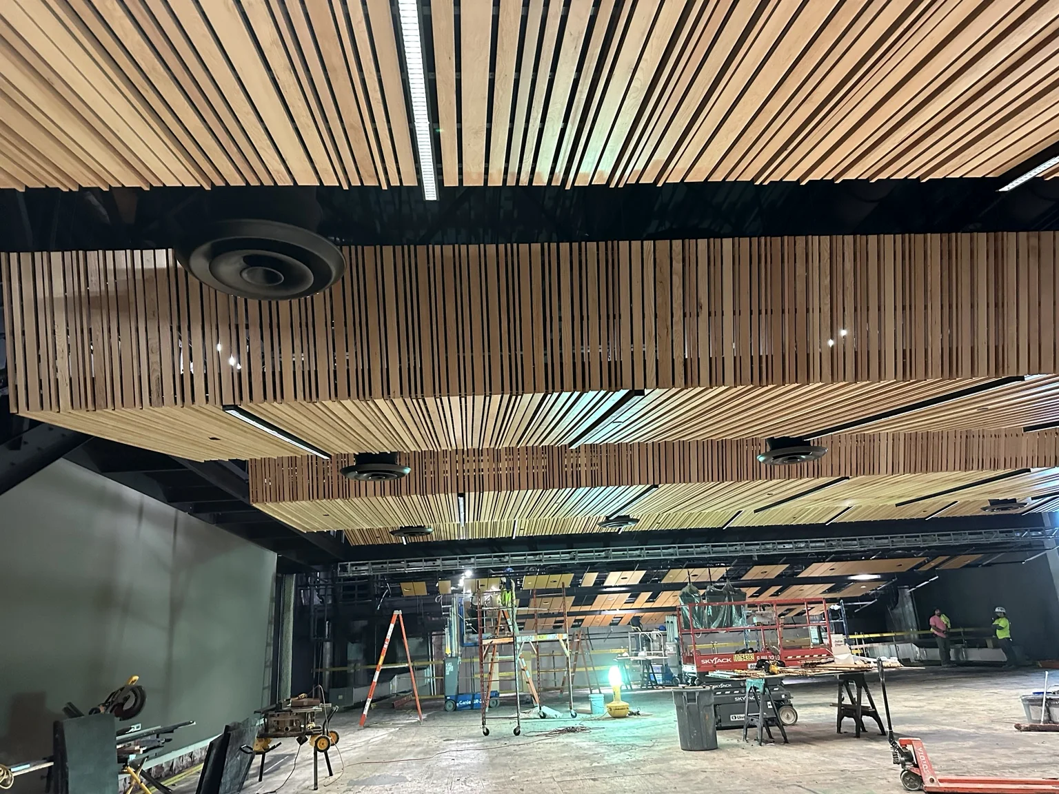 Large architectural wood ceiling installation in a commercial space